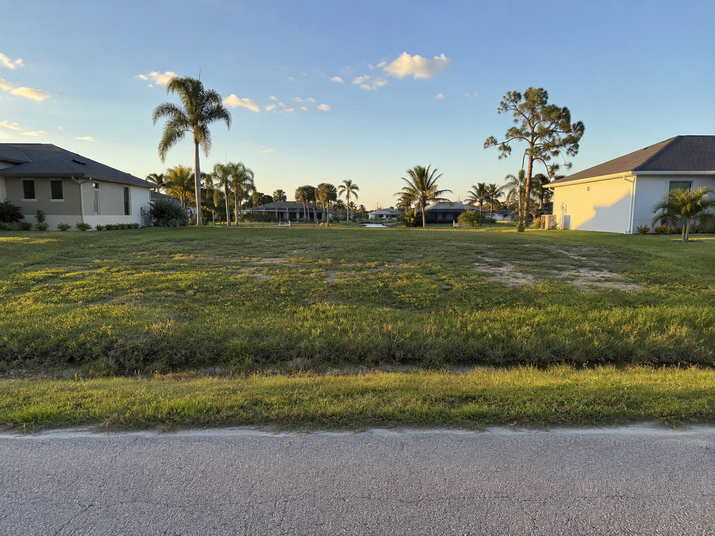 Representative vacant infill lot between homes in Cape Coral, Florida